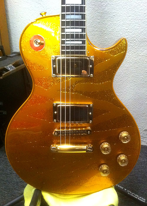 Custom painted gold textured applied to a Les Paul