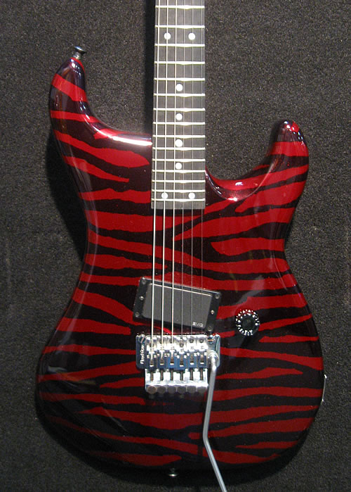 Custom painted red and black tiger-striped Strat